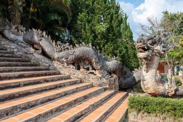 The dragon guarding the entrance to the pagoda Linh An. Pagoda is located in Nam Ban hamlet around 30km southwest of Dalat, Vietnam.