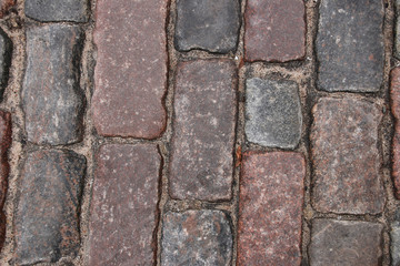 Old stone paved avenue street road, view from above