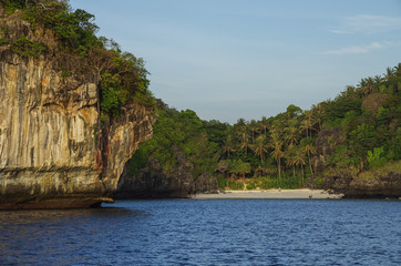 Hidden tropical beach and beautiful limestone cliffs around on sunset at Phi Phi Koh, south of Thailand, Krabi Province, Thailand, Asia