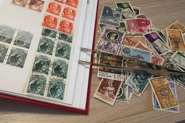 Fototapeta na wymiar Stamps collection and some tools