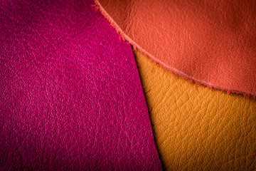 Natural colored leather background closeup.