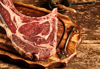 Prime matured raw tomahawk steak