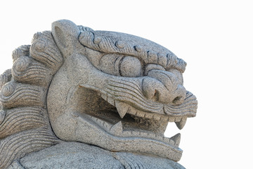 Lion statue of a white background.