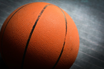 basketball on a black floor