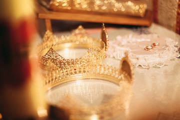 Elegant wedding crown or tiara preparing for marriage in church © olegparylyak