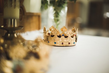 Fototapeta na wymiar Elegant wedding crown or tiara preparing for marriage in church