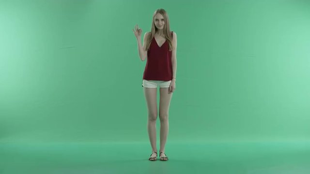 Woman And a Gesture okay on a Green Screen