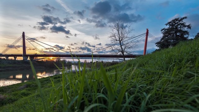 Time-lapse of the Indiano bridge over the Arno river at sunset