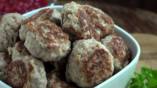 Rotating Mini Burgers (fresh made, seamless loopable 4K UHD footage)