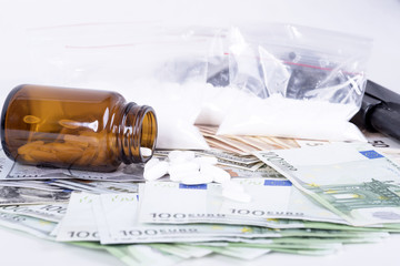 drugs,money,cocaine and gun