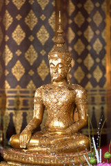 Buddha in Wat Naphrameru temple in Ayuttha Historical Park of Thailand.