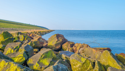 Dike along a lake in winter