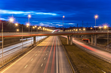 Fototapeta na wymiar car light trails on motorway junction