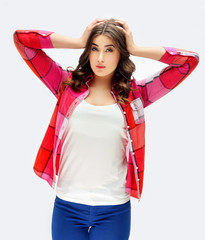 Portrait of confused young woman 