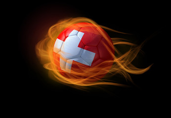 Naklejka premium Soccer ball with the national flag of Switzerland, making a flame.