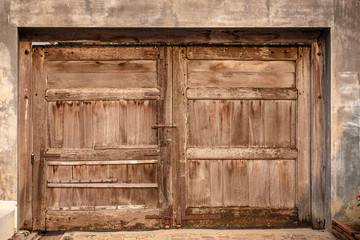 Old wooden door on the wall