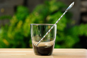 empty glass with spoon