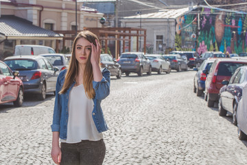 Beautiful girl in a photo shoot in the city