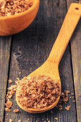 Crystal flakes of smoked natural sea salt.