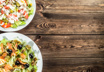 Set of salad with salmon and vegetables.