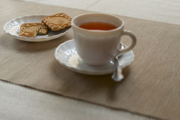 tea Cup and saucer with cookies