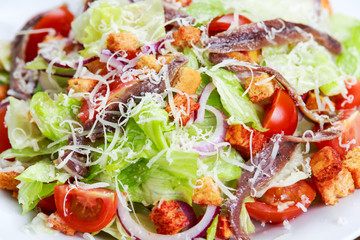 Fresh healthy Classic Caesar salad with anchovies.