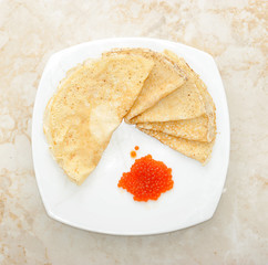 pancakes with caviar.top view