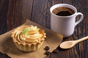 Coffee cup and cake