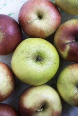 Apples on wooden background