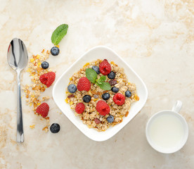 Muesli cereal with raspberries and blueberries. Healthy Breakfas