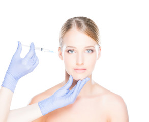 Doctor injecting botox into a woman's face