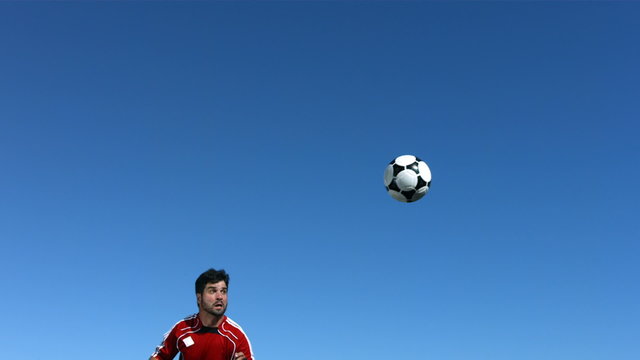 Slow motion soccer headbutt