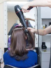 Fototapeta premium blow-drying in a beauty salon