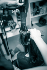 blow-drying in a beauty salon