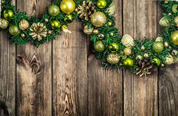 Christmas wreath on wooden background