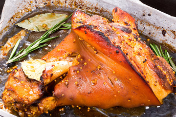 roast pork knuckle with rosemary, pepper, garlic, mustard and sp