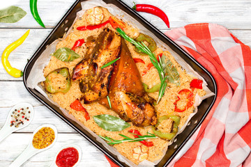 roast pork knuckle with braised cabbage, pepper, garlic and spic