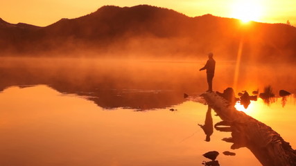 Fishing at sunrise