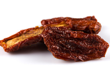 dried tomatoes on white background