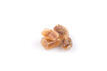 Brown caramelized lump cane sugar cube