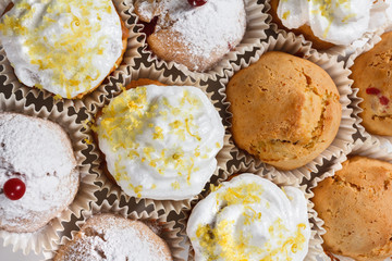 Muffins with cranberries and lemon zest, closeup