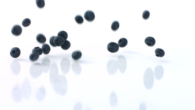 Blueberries falling and bouncing