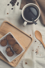 Black coffee with cookies vintage style