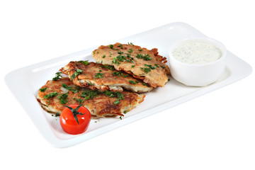 Potato flapjacks on flat ceramic dish, isolated on white backgro