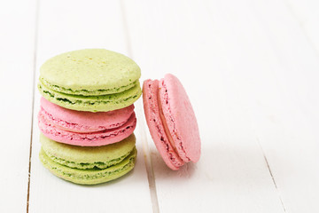 Homemade  macaroons on black vintage table.
