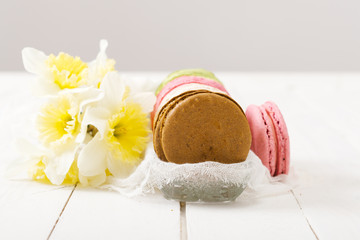 Homemade  macaroons on black vintage table.