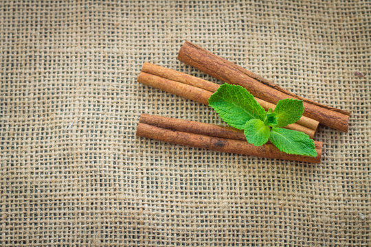 cinnamon sticks on sacking