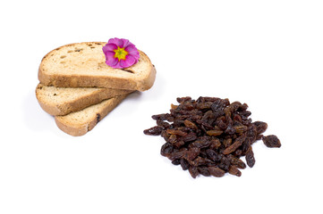 three croutons decorated with a flower and raisin handful
