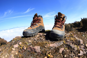 hiking boots on beautiful mountain peak