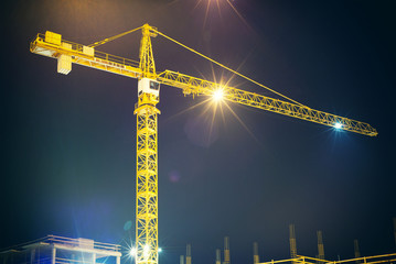 crane and illumination at night